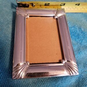 Silver toned small picture frame plastic for wallet size photos